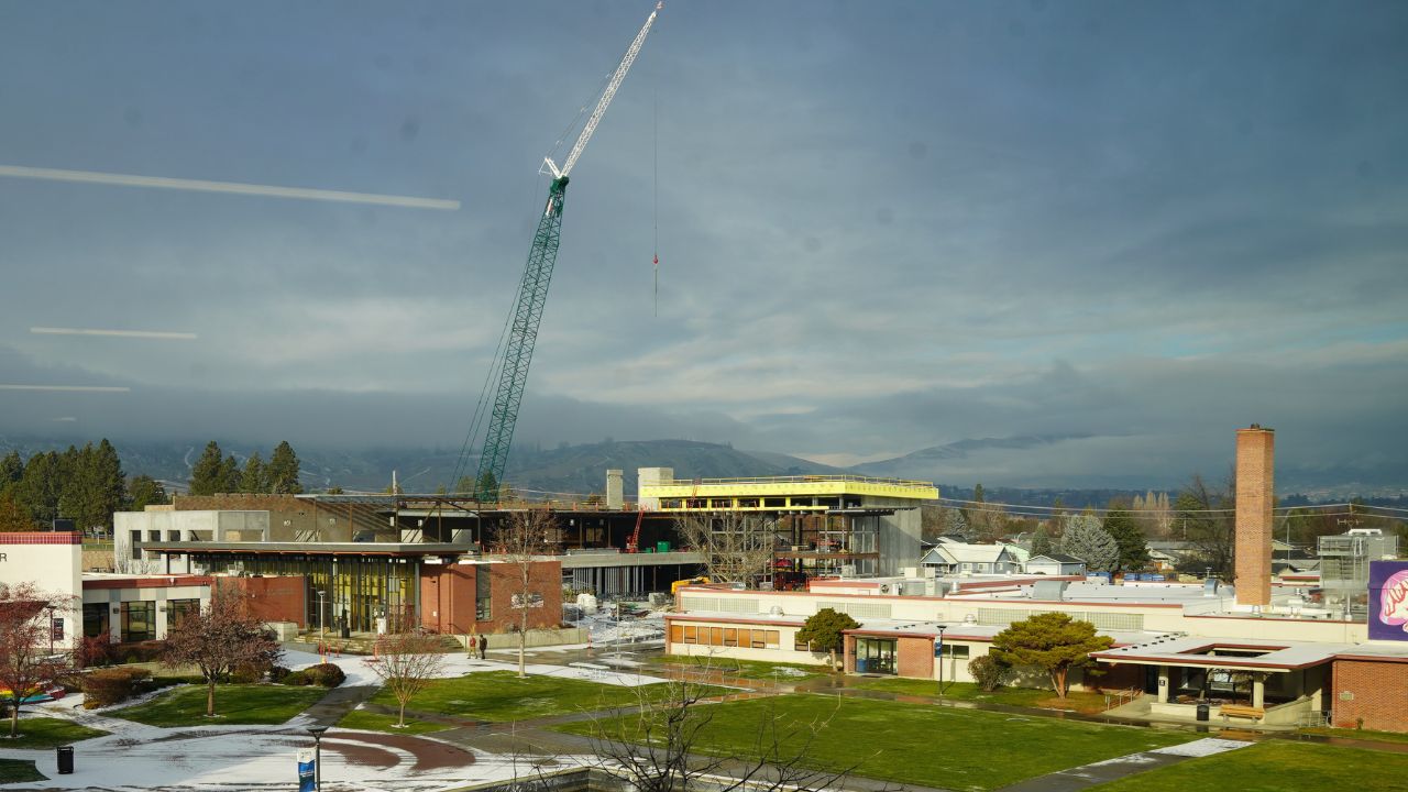 Large crane above construction site for new CTEI buildling on Wenatchee Campus